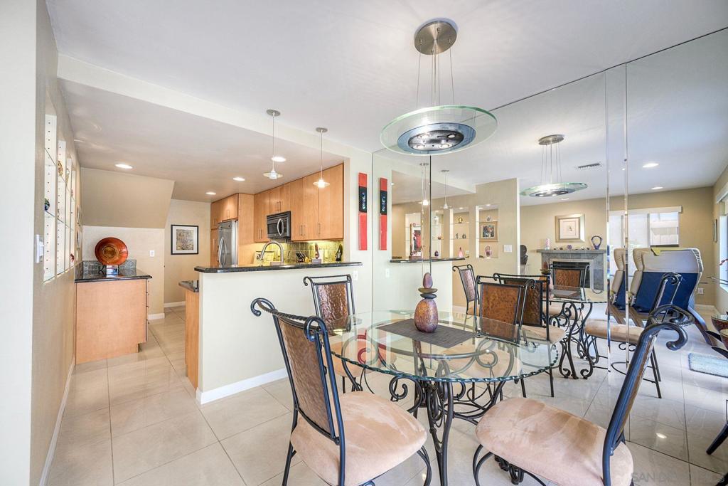 Absolutely gorgeous end unit property that has been entirely upgraded! The stunning home features: completely remodeled kitchen with high end cabinets and upgraded counters, tile backsplash, s/s appliances, tile flooring, plus custom lighting. Bathrooms also fully remodeled with frameless enclosures, slate showers, and ubatuba countertops. More features-skylights, ceiling fans, custom outdoor patio pavers, newer AC and furnace, plus more. This home is immaculate and is a must see!
