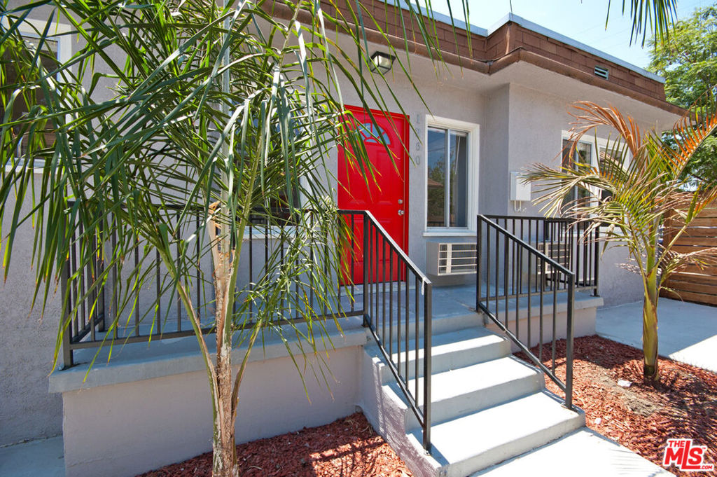 Welcome to this charming Silver Lake detached bungalow just minutes from Sunset Junction. The secure gated entry leads to a neatly manicured courtyard garden. Bright, cheery and remodeled throughout including laminate wood floors, stone countertops, and updated appliances. For convenience enjoy your own in-unit washer/dryer. Ample closet space and HVAC wall units provide comfort in this airy and open one bedroom unit. One designated parking space is included in a small parking lot behind building. Available for occupancy in mid October!