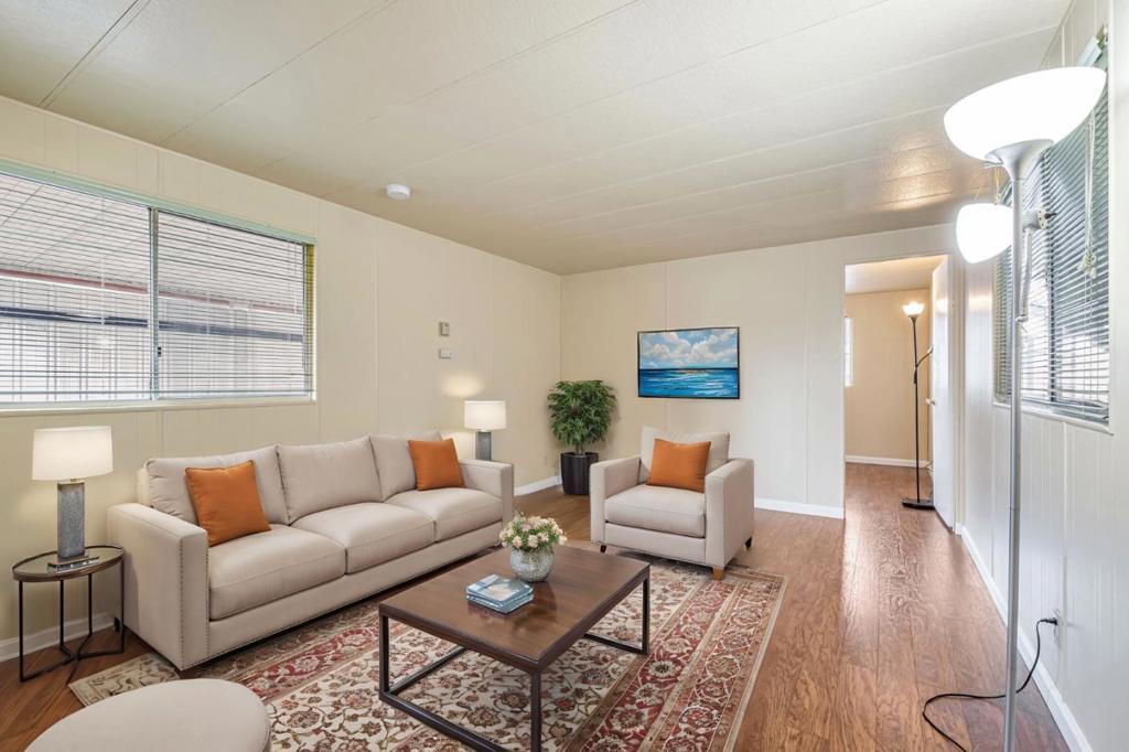 This well-maintained home presents a fantastic opportunity to own in the highly desirable Scotts Valley area. Situated in the serene and friendly Mountain Brook Park, a 44-unit co-op owned community, this home offers the unique advantage of land ownership, eliminating costly space rent and instead only requiring a modest $210 monthly HOA fee. The home boasts a spacious outdoor patio area, complete with a private yard and convenient storage shed, perfect for storing your outdoor gear. Its prime location near Scotts Valley Market ensures easy access to daily necessities, while the proximity to Roaring Camp Railroads and Siltanen Park provides opportunities for family entertainment and recreational activities. Nature lovers will delight in the nearby Glenwood Preserve, with its scenic hiking trails winding through lush landscapes. Families with children will greatly benefit from the exceptional Scotts Valley school district. This mobile home offers an unbeatable combination of affordability, ample living space, and access to a wide array of vibrant community amenities, making it an ideal choice for families, couples, or individuals seeking a comfortable and convenient lifestyle in a thriving, all-ages park with a strong sense of community spirit.