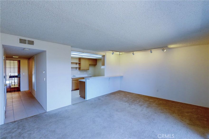 Beautifully maintained 1-bedroom, 1-bathroom condo located in the heart of Huntington Beach. This upper-level unit features a south-facing balcony with full views of the Huntington Beach Air Show, perfect for enjoying ocean breezes and natural light. Interior highlights include an open layout for flexible living, Italian tile flooring, a Jacuzzi tub, and LED lighting throughout. Situated in a gated, pet-friendly community with one covered and one uncovered assigned parking space, plus a private storage room. Residents enjoy resort-style amenities including a pool, spa, gym, BBQ area, and game room. Located in sought-after school districts (with Huntington Beach Union High School District having an A+ rating), this home offers exceptional lifestyle living just minutes from the beach, shopping, dining, and entertainment—live where others vacation in one of Orange County’s most desirable communities.
