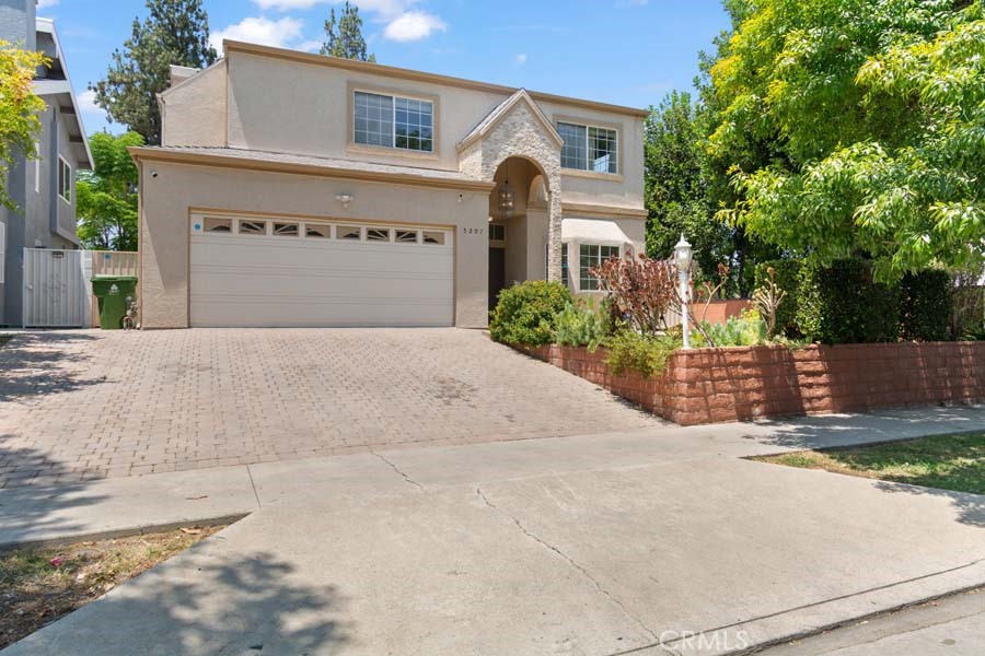 LOWEST PRICED HOME IN TARZANA - SOUTH OF VENTURA - This beautiful private 4 bedroom 3 bath home built in 1992 has 1 bedroom and 1 bath down stairs and 3 bedrooms and 2 bath upstairs including a large master bedroom. It shows much larger in person due to its high ceiling and larger bedrooms than a standard home... It has a large dining area and a backyard with a beautiful gazebo right outside the kitchen for your ultimate dining experience among the many fruit trees. With all it's many upgrades, including a TESLA charger, and WALKING DISTANCE to everything such as Synagogues, Churches, Cedar Sinai Hospital and Tarzana Medical Urgent Cares, Starbucks, Major Grocery stores and pharmacies, LA Fitness, and all kind varieties of top restaurants you'll be finding your next home being one of a kind. This home wont last, so submit your offer TODAY!