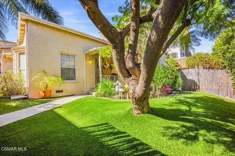 Photo of 1219 Dunsmuir Avenue, Los Angeles, CA 90019 (MLS # 226001045)