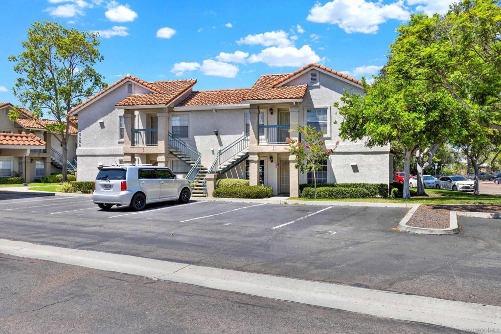 Discover a rare opportunity to own a beautifully maintained ground-level condo in the sought-after Summit Ridge community of Mira Mesa. This light-filled 1-bedroom, 1-bathroom home is thoughtfully designed for comfort and style, featuring a modern kitchen with elegant quartz countertops, white cabinetry, and stainless steel appliances. Step inside to an open layout that flows seamlessly into the cozy living room, complete with gas fireplace and upgraded vinyl flooring throughout. The spacious bedroom includes a generous 13x12 layout and the unit includes central A/C and assigned covered parking with guest parking available. Enjoy your own private patio space, plus access to resort style amenities including a pool, hot tub, fitness center and greenbelt views.