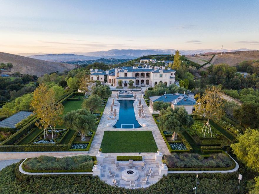 World class French Romantic masterpiece! Truly one of California's most distinct properties. Privately gate guarded 33 acre compound reimagined from the ground up with no expense spared. Enter past a majestic 1/4 acre lake & authentic mill house,formal gardens,stone bridges & four cascading pools inspired by the Monet Gardens of Giverny, France. The main residence spans over 32,000 SF and is graced with 360 degree views & every conceivable amenity imaginable. Features incl. a one of a kind sound proof Dolby certified cinema with 20'x10' screen. There is also an amazing collectors museum, 5000 SF grand master suite & more. The resort grounds provide an 11,000 SF guest hse, working 5 acre organic farm, 2644 SF pool house/spa, two pools & 2 municipal quality wells. Call for much more info.