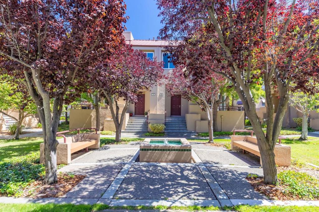 Light-filled corner townhome in one of Foster Citys most desirable and serene communities! This 2-bedroom, 2-bath tri-level home features soaring vaulted ceilings, abundant natural light, a cozy fireplace, and a private balcony. The spacious primary suite offers a large walk-in closet, and additional highlights include an attached 2-car garage, in-unit laundry, and generous storage. Enjoy access to a community pool and sun deck, plus a prime location near top-rated schools, parks, trails, shopping, dining, and major employers.