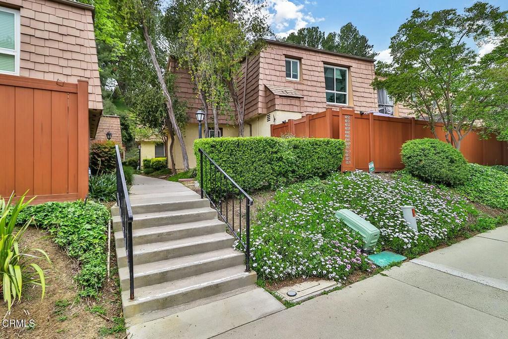 Welcome to Liberty Canyon Townhomes - A Hidden Gem in the Hills!Nestled in the serene and scenic Liberty Canyon community, this spacious 3-bedroom, 2-bathroom condo offers beautiful mountain views, lush green spaces, and access to a sparkling community pool. Surrounded by mature trees and impeccably maintained grounds, this home offers a peaceful retreat with all the comforts of modern living.This unique floor plan features a desirable downstairs bedroom with direct access to a private patio--perfect for guests, a home office, or multi-generational living. The main living areas are open and airy, creating a warm and welcoming space to relax or entertain. All bedrooms are generously sized with ample closet space throughout. Enjoy added comfort and improved insulation with new upgraded energy-efficient dual-pane windows and doors throughout. Laundry hook up are also available for the unit.Step outside to your oversized patio, thoughtfully divided into multiple areas for dining, lounging, or gardening, with convenient access to your designated parking spots.With great bones and endless potential, this is your opportunity to bring your vision to life. Fresh paint and a little imagination will go a long way in making this special home your own.Located in the highly sought-after Las Virgenes School District and surrounded by nature, trails, and open space, this property combines convenience, community, and inspiration.Don't miss your chance to create something beautiful in one of Agoura Hills' most desirable neighborhoods!For the safety and security of all parties, there may be active security cameras and/or audio recording devices on the premises. By entering the property, you acknowledge that you may be recorded. All information is deemed reliable but not guaranteed. Recommend doing your own due diligence. Property is a single story on the first floor but elevator or stairs are required to access the unit. While all information is deemed reliable, buyers are encouraged to conduct their own due diligence.