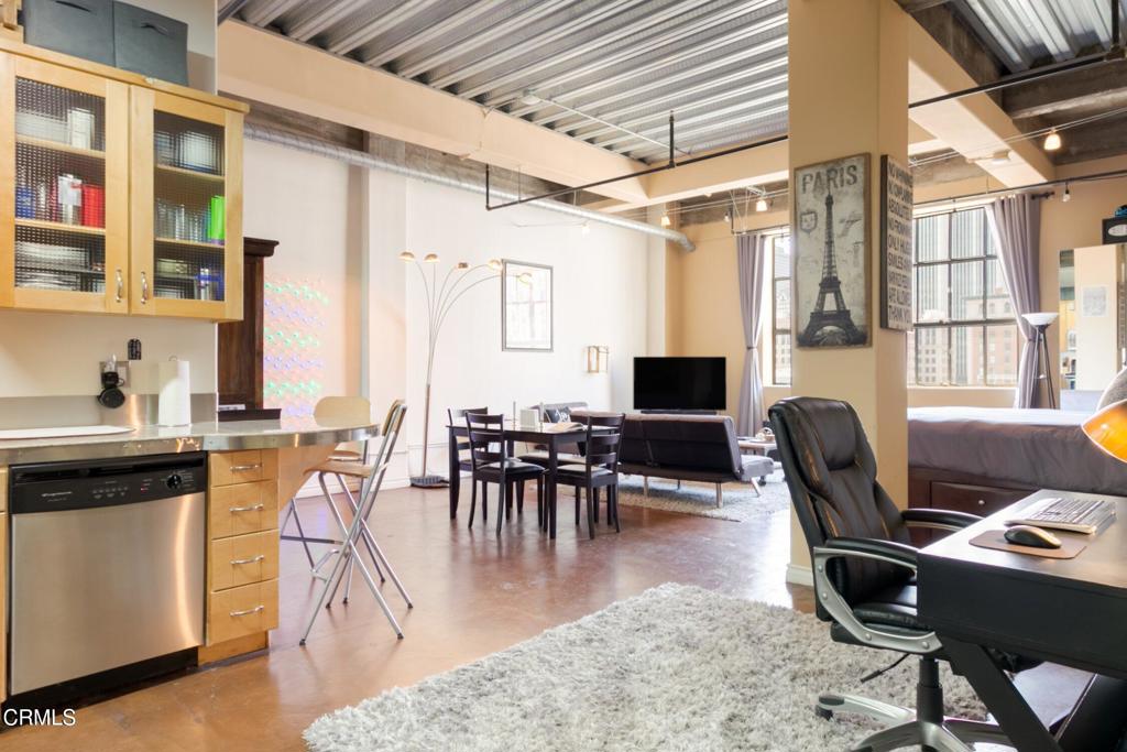 Exceptional studio loft with incredible, panoramic views of the Downtown Los Angeles Skyline from the 7th floor of the SB Grand building at 5th and Broadway. Originally built in the 1920's, the building was converted to loft style condominium homes in the early 2000s and showcases concrete floors, high ceilings, large windows, and updated amenities including in-home washer/dryer. Loft #705 has successfully rented as a premier short term rental home with the Airbnb platform for many years making this a unique opportunity to purchase a turnkey Airbnb business or to make this special space your own home. Average revenues in prior years approaching $50,000 per year. Large, loft style living with an open plan kitchen, spacious living area and the incredible light you can see in the images. Residents enjoy the rooftop deck and pool, onsite exercise room and 24 hour doorman services. Broadway restaurants and bars, hotspots like Perch, the Last Bookstore, Grand Central Market, Bunker Hill and more. Located steps from the Pershing Square Metro station and perfectly positioned to benefit from the coming investments in Downtown LA as we welcome the World Cup and Olympics in coming years.