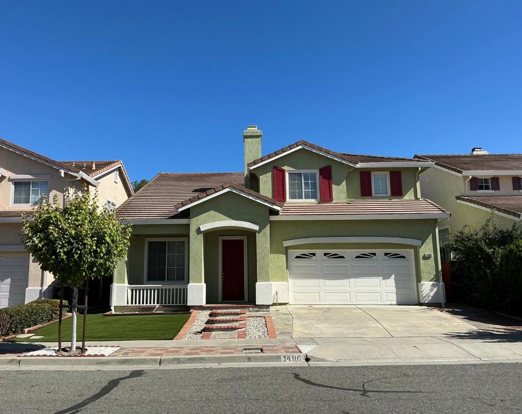 Welcome to this spacious 5-bedroom, 3-bathroom home located in the vibrant city of San Jose. With a generous 2,277 sq ft of living space, this residence is designed for comfort and functionality. The kitchen is a culinary enthusiast's dream, featuring a gas cooktop, built-in oven, microwave, dishwasher, Corian countertops, and a central island for added convenience. The kitchen opens to a family room, promoting a seamless flow for gatherings. Downstairs bedroom and full bath can function as in-law quarters or home office. High ceilings and a walk-in closet add to the home's appeal. Enjoy the warmth and ambiance provided by the fireplace, a perfect complement to the central forced air heating system. The flooring is a tasteful mix of carpet and hardwood, enhancing the home's aesthetic. The laundry room is equipped with both gas and electricity hookups, including a washer and dryer for convenience. Enjoy the best of North Valley, nearby Berryessa BART and light rail stations, Costco Wholesale, Pacific Rim Plaza with Ranch 99, Brokaw Commons with H-Mart, Municipal Golf Course, Penitencia Creek Park, convenience to commute thru highway 101, highway 680, and much more.