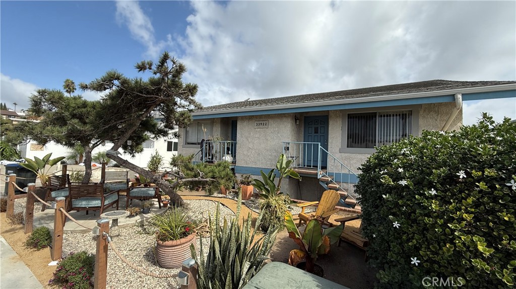 Wonderful location in Central Dana Point's Lantern District. 5 plex building. New paint, Laminate flooring, shaker cabinets in the kitchen and bathrooms vanities, quartz counters! Beach, Harbor & Town Center close!