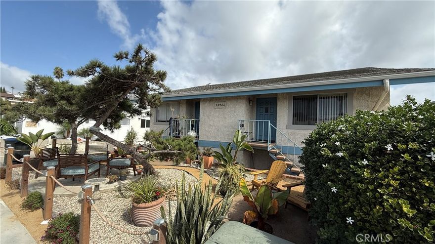 Wonderful location in Central Dana Point's Lantern District.  5 plex building. New paint, Laminate flooring, shaker cabinets in the kitchen and bathrooms vanities, quartz counters! Beach, Harbor & Town Center close!