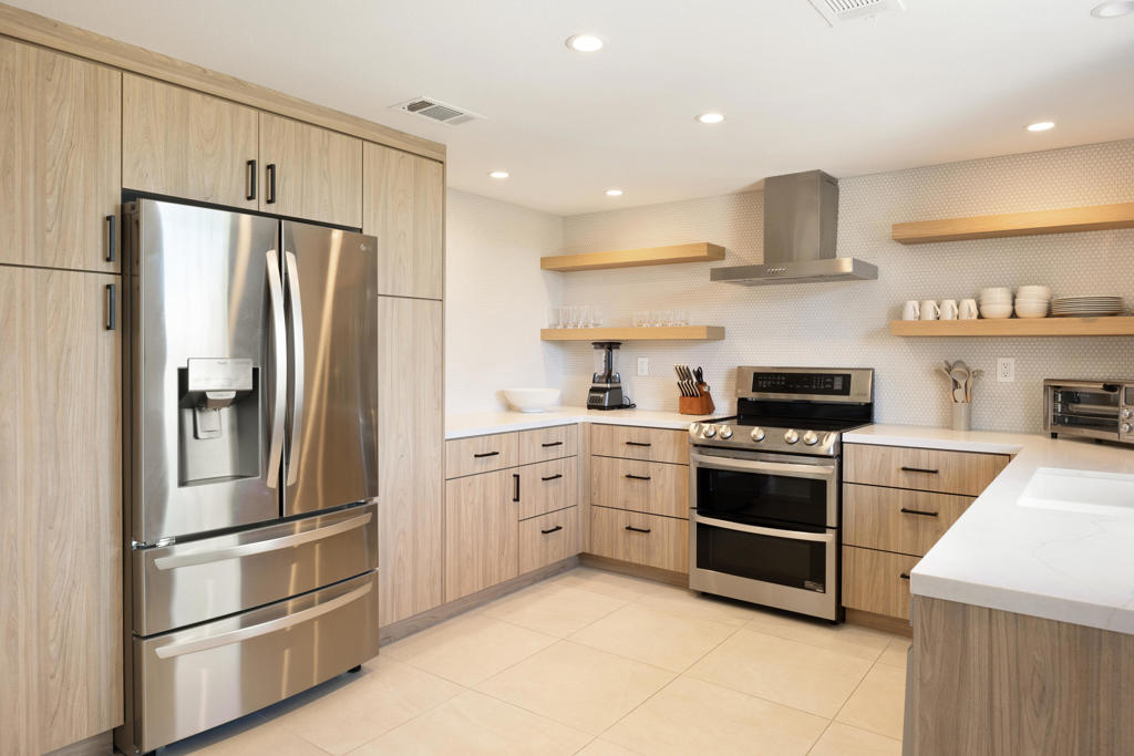Welcome to your dream desert retreat in the highly sought-after Monterey Country Club! This completely renovated 3 bedroom + Den, 2 bathroom condo combines modern luxury with serene living. Thoughtfully designed finishes throughout create a calming ambiance, making this home a true sanctuary. The main living space boasts soaring high ceilings, filling the home with an abundance of natural light and offering an airy, open feel. The beautifully updated kitchen features premium appliances, sleek cabinetry, and an elegant backsplash, perfect for cooking or entertaining. Both bathrooms have been meticulously upgraded with spa-like touches for ultimate comfort. Step outside to your private patio overlooking the golf course, where you'll enjoy breathtaking fairway views and peaceful desert sunrises. Whether sipping your morning coffee or hosting an al fresco dinner, this space is sure to become a favorite spot to relax and unwind. Situated in the heart of Palm Desert, Monterey Country Club offers resort-style living with 27 holes of golf, tennis, pickleball, fitness facilities, and multiple pools. Close to shopping, dining, and entertainment, this is the perfect place to embrace the desert lifestyle. Monterey CC allows Short Term Rentals which is a huge plus for owners looking to offset some of the ownership cost! Don't miss this opportunity to own a truly one-of-a- kind property in an unbeatable location. Schedule your private tour today!
