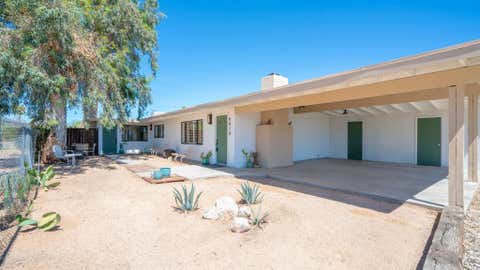 Photo of 6010 Ocotillo Avenue, 29 Palms, CA 92277 (MLS # 219149731DA)