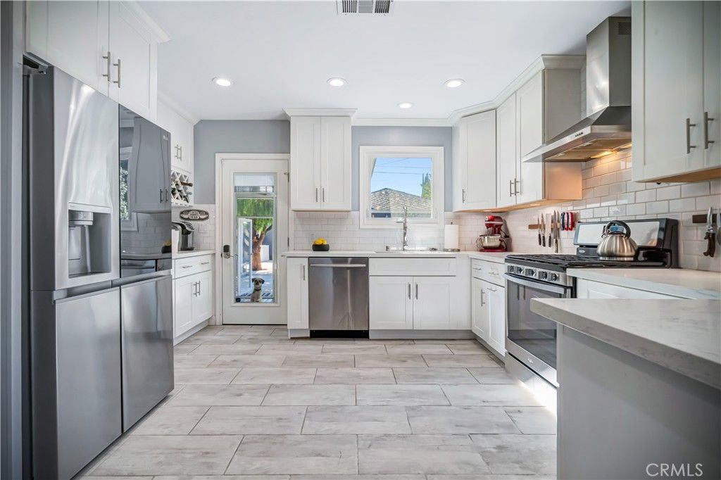 Photo of 6455 Densmore Avenue, Lake Balboa, CA 91406 (MLS # SR25172325)