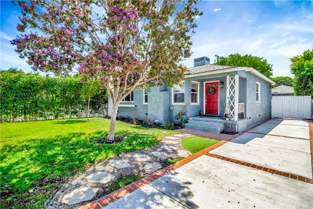 Welcome to this beautifully updated 3 bed, 2 bath turnkey smart home in one of Lake Balboa’s most desirable neighborhoods! Behind a white picket fence, you’ll find 1,356 sq ft of thoughtfully designed living space—plus a 150 sq ft bonus sunroom perfect for a home office, art studio or a playroom.
This home seamlessly blends artistic elegance with everyday comfort, featuring an open, sun-filled layout with hardwood floors, crown molding, recessed lighting, and a chef’s kitchen with quartz countertops, subway tile backsplash, and stainless steel appliances. The dining area shines with designer lighting that adds a beautiful touch for hosting or everyday meals.
Smart upgrades include Ethernet wiring throughout, built-in surround sound, copper plumbing, a tankless water heater, energy efficient windows and much more.
Step outside to your private, fenced yard with a manicured lawn, safe animal run, outdoor TV, and potential for an ADU in the detached garage (buyer to verify). All just minutes from Lake Balboa Park, Woodley Park, golf courses, trails, and recreation.
This home truly has it all—style, comfort, and location. Welcome home!