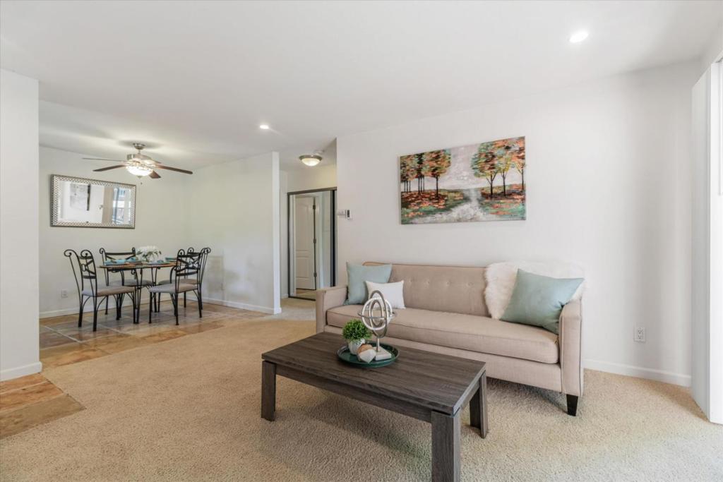 A beautiful 1-bedroom, 1-bathroom condo located in the highly desirable Sierra Crest community. This top-floor unit offers a perfect blend of comfort & convenience. Step into the spacious living room featuring plush carpeting, recessed lighting, & access to a private balcony with a storage room, perfect for enjoying your morning coffee or unwinding in the evening. The attached dining area, equipped with a ceiling fan, is adjacent to the kitchen, boasting stainless steel appliances, a brand-new microwave/hood, & sleek granite countertops, ideal for your culinary adventures. The large bedroom offers ample space to relax & recharge, complete with a generous walk-in closet for all your storage needs. The bathroom is well-appointed, providing both style & functionality. The convenience of an in-unit washer & dryer makes daily living even easier. Residents of Sierra Crest enjoy access to top-notch amenities, including a sparkling pool, spa/jacuzzi, gym, & clubhouse, everything you need for a balanced lifestyle. With one assigned carport spot, parking is never a hassle. The location is unbeatable, just moments away from the vibrant Santana Row, Valley Fair, San Jose City College, & a variety of dining options. Plus, with easy access to 280, 880 & 17 freeways, commuting is a breeze.