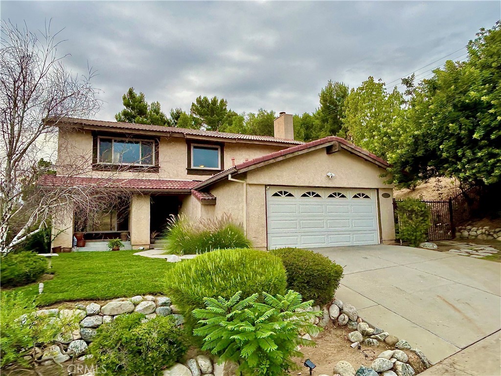 PRICED TO SELL!!! Beautiful 4-Bedroom Home in Rancho Cascades, Sylmar. Located in the highly desirable Rancho Cascades neighborhood, this gorgeous 4-bedroom, 2.5-bathroom home offers 2,114 sq ft of comfortable living space with a bright, open floor plan. The spacious layout includes a family room, dining area, kitchen featuring brand-new quartz countertops and large windows that fill the home with natural light. Upstairs you’ll find a large master suite with a walk-in closet and full bath, along with three additional bedrooms and another full bathroom. The interior has been freshly painted, with tasteful updates in the guest and master bathrooms. Central A/C and heat keep the home comfortable year-round or enjoy the natural mountain breeze by simply opening the windows. The newly landscaped front yard features fresh sod and an automatic sprinkler system, while the expansive backyard is a blank canvas ready for outdoor living, BBQs, or family gatherings. With no direct neighbors behind and an easement on one side, you’ll enjoy added privacy in a quiet, peaceful setting. This move-in ready home offers space, comfort, and convenience in a prime location. Don’t miss out—schedule your showing today!