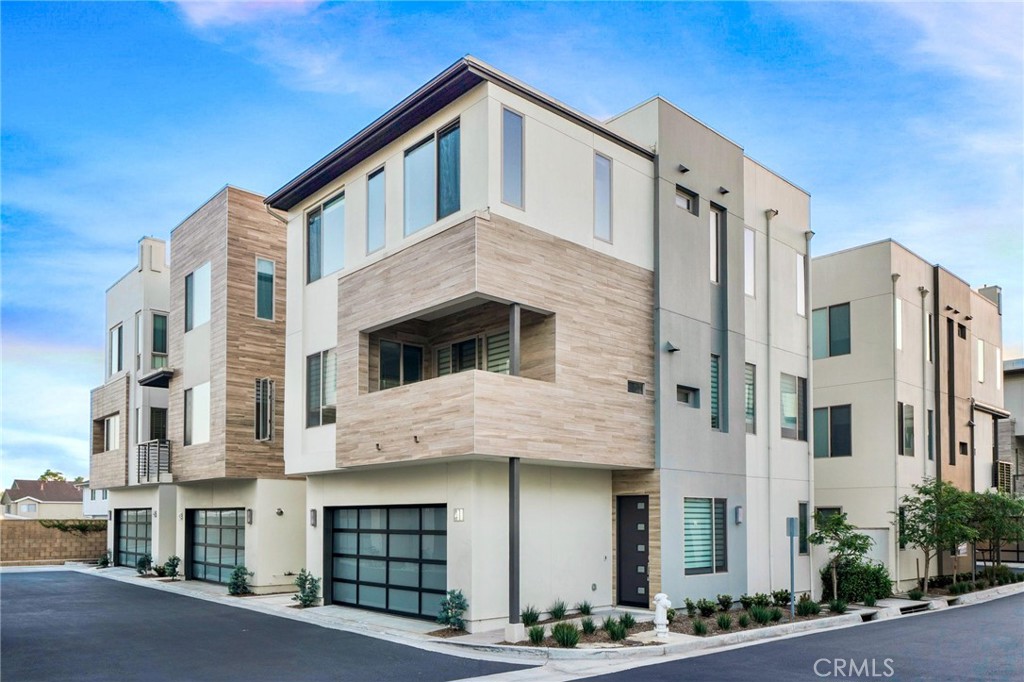 Presenting 41 Ebb Tide Circle, a sophisticated 4-bedroom, 3.5-bath coastal retreat ideally situated within Newport Beach’s coveted Ebb Tide community. Just moments from the sand and surf, this residence showcases the community’s most desirable and spacious floor plan, complemented by one of the largest rooftop decks in the enclave.
The entry level offers a private bedroom with an en-suite bathroom, perfect for guests or a home office, along with direct access to the two-car garage. The second level reveals an open-concept living space designed for effortless entertaining, featuring a gourmet kitchen with premium stainless steel appliances, an expansive center island, and an adjoining dining area that flows seamlessly into the light-filled living room and balcony.
On the upper level, the primary suite provides a tranquil retreat complete with a luxurious en-suite bath, joined by two additional bedrooms and a full bathroom. The crown jewel of the home awaits above, a spacious rooftop deck equipped with a built-in outdoor kitchen, ideal for al fresco dining and enjoying panoramic sunset views.
Perfectly positioned within the community near the resort-style pool and spa, this residence embodies the essence of modern coastal living, offering a rare blend of space, style, and Newport Beach sophistication.