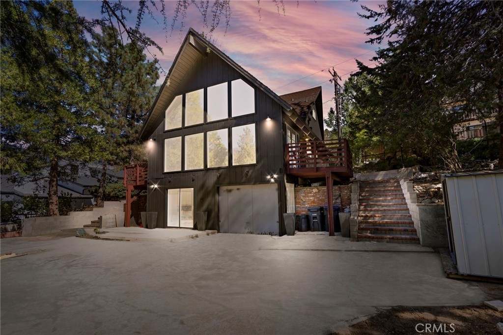 Welcome to your mountain escape in Wrightwood! This beautifully remodeled and upgraded home offers space, style, and views you’ll love. The tall A-frame front windows and soaring ceilings fill the living room with natural light, highlighting the rustic-modern charm.
The main level features two comfortable bedrooms and a full bath, while the upper level bedroom provides a private retreat. Downstairs, the spacious basement offers multiple bonus rooms—perfect for extra bedrooms, a family room, or creative studios to fit your lifestyle.
Step outside to enjoy a fenced side yard, perfect for pets or a garden, along with a large driveway and welcoming front porch that set the tone for mountain living. From inside and out, soak in the amazing views of the surrounding peaks and skies.
Located just minutes from Mountain High Ski Resort, you’ll have year-round adventure at your doorstep—whether it’s skiing, hiking, or simply relaxing in the crisp mountain air.
Don’t miss the chance to own this unique Wrightwood property that blends upgrades, versatility, and unbeatable location!
All information deemed reliable but not guaranteed. Agents/buyers to verify all information and perform due diligence.