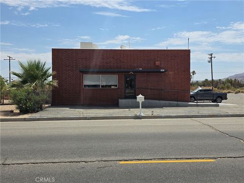 Photo of 6767 Adobe Rd, 29 Palms, CA 92277 (MLS # JT26156870)