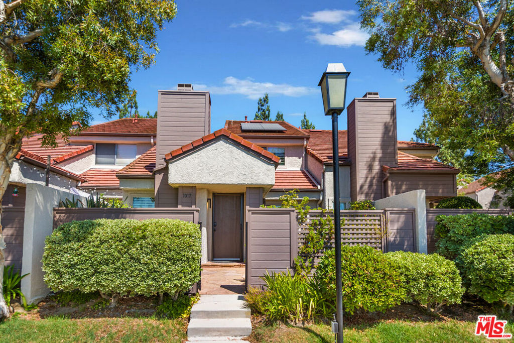 Welcome to Hidden Canyon! This beautifully updated 3 bed/2.5 bath townhouse sits in one of the community's most sought-after locations, perched at the top with sweeping sunset views. The largest floor plan in the complex. This move-in-ready home features a paid-off solar system with a Powerwall battery, providing energy efficiency and backup power, plus a Tesla charger in the attached two-car garage. Inside, the open-concept layout showcases a stylishly remodeled kitchen with natural quartzite countertops, custom pull-out cabinetry and a built-in wine fridge. The kitchen flows seamlessly into the dining area, family room, and living room, where vaulted ceilings, a fireplace, and custom shiplap detailing add character and warmth. Upstairs, the spacious primary suite enjoys incredible views, three closets, and a renovated bathroom with dual sinks and abundant storage. Two additional bedrooms and updated baths complete the upstairs retreat. Additional highlights include recessed lighting throughout, washer/dryer in the garage. The community offers 3 pools, 6 spas, and a playground, all within minutes of hiking trails, shopping, dining, and award-winning schools. A rare opportunity to own a home that combines charm, functionality, and sustainable living in one of Hidden Canyon's best spots!