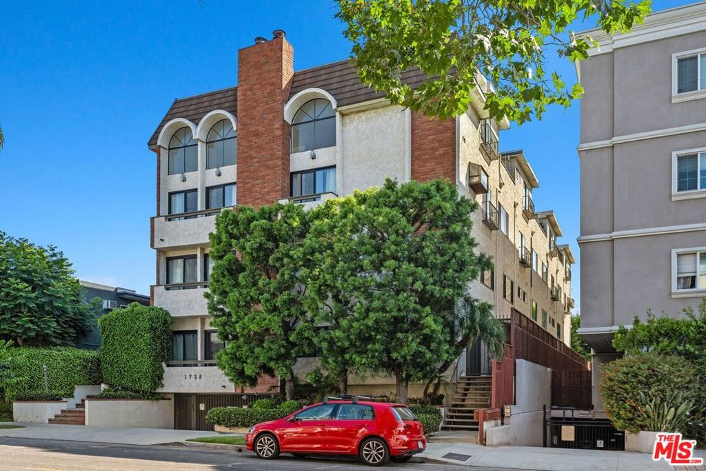 Tucked away on a peaceful, tree-lined street just blocks from the lively energy of Sawtelle, this beautifully updated top floor penthouse offers the perfect blend of modern style and urban convenience. Spanning 1,895 square feet, the light-filled 2-bedroom, 2.5-bath home features soaring ceilings in the main living room, framed by oversized windows and new sliding glass doors that create an airy, open feel. The kitchen is a cook's dream with brand-new sleek quartz countertops and top-tier appliances, seamlessly connected to a sunlit dining room ideal for relaxed family dinners or hosting friends. The primary suite is a private retreat with its own spa-like ensuite bath, as well as an in-unit washer and dryer, while the upstairs bedroom, also with an ensuite, works beautifully as a guest room, home office, or personal hideaway. Step out onto your expansive private rooftop patio perfect for morning coffee, evening wine, or watching the sun set over the city skyline. Additional perks in this ten-unit boutique building include two tandem parking spaces with direct entry from the gated garage for convenience and security. Just minutes from some of LA's best restaurants, shopping, newly renovated community center, YMCA and freeway access. This is your chance to own a stunning home in one of the city's most coveted neighborhoods.