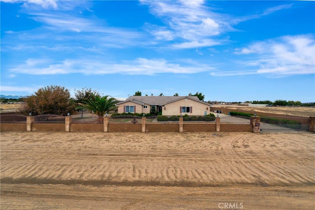 Photo of 8347 W Avenue D10, Lancaster, CA 93536 (MLS # SR25267600)