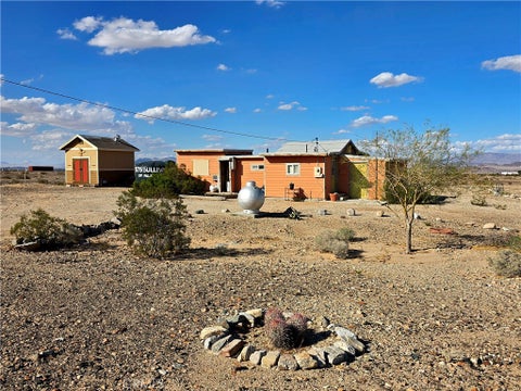 Photo of 77575 Sullivan RD, 29 Palms, CA 92277 (MLS # JT26229010)