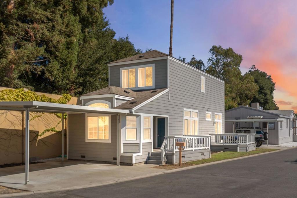 A rare two-story, three-bedroom, two-bathroom home in an all ages, pet friendly community. The bright living area is filled with abundant natural light and features insulated laminated flooring, updated lighting, and a custom stair railing. The fully remodeled kitchen offers quartz countertops with gold accents, a stylish backsplash, ZLINE hood, and Italian fireclay farmhouse sink. Bathrooms have been thoughtfully upgraded with skirted toilets, modern vanities, and shower heads with water filters. A full bedroom and bath on the main level provide flexibility for guests or multi-generational living, while the upstairs bedrooms, including the primary suite with sunset views, offer privacy and comfort. Additional highlights include side-by-side covered parking, a rare upgrade, as well as a brand-new electrical system, insta-hot tankless water heater, and shower filtration system. The community offers resort-style amenities such as a clubhouse, pool, cabana with kitchen for entertaining, and nightly security. This prime location provides easy access to Highways 101, 85, shopping centers, dining, and family-friendly recreation. Nearby, The Plex offers indoor sports, martial arts, a spa, and dining, while Coyote Creek Trail is perfect for cycling, running, and walking.