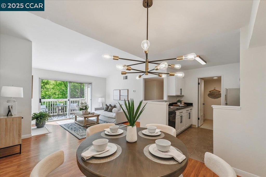 Prime location in gated San Ramon community, close to everything! This move-in-ready 2nd-floor condo is full of natural light with views of the lagoon. The open kitchen overlooks the living room and private patio and has a large pantry and laundry room with full-size washer and dryer. The master suite is spacious with oversized closet. New paint, carpet, vanities and lighting. Move in Ready! Enjoy amenities including pool, BBQ area, gym, clubhouse, and spa. Very close to shopping, Trader Joe's, Starbucks, City Center, Bishop Ranch, restaurants, and the Iron Horse trail. Everything you need right at your doorstep. No rental restrictions. Seller paid assessment. ENTER FROM SPRINGFIELD DR behind Market Place do not enter via Alcosta, that gate is closed. Open Sunday 2-4pm