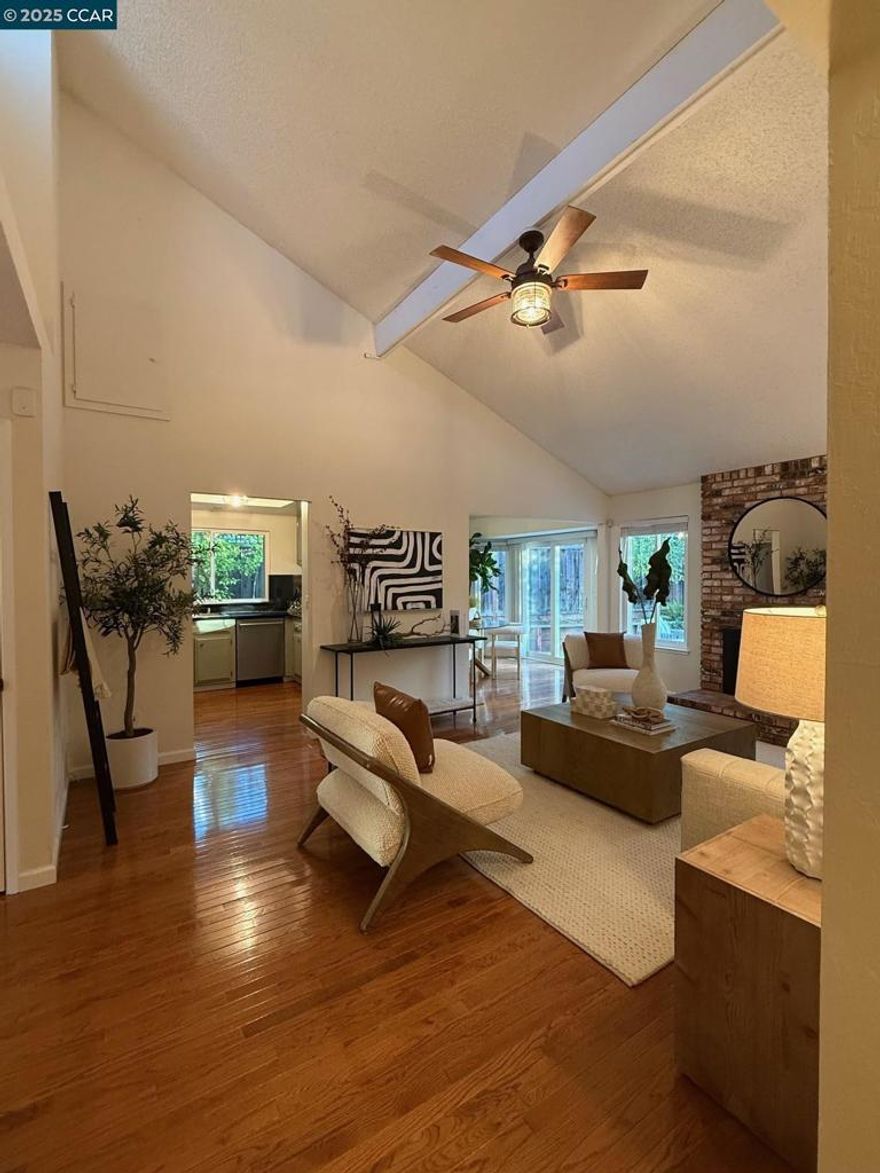 Welcome to 5340 Paso Del Rio Way, a beautifully maintained and updated home offering the perfect blend of comfort, style, and functionality. This inviting single-story residence features three bedrooms plus an optional office — ideal for remote work, guests, or a hobby space. Inside, you’ll love the high ceilings, hardwood floors throughout, and abundant natural light that give the home an airy, spacious feel.  The kitchen, dining, and family room flow together, creating a warm and welcoming space for everyday living or entertaining. A brick gas fireplace adds cozy charm, and from the kitchen you can enjoy peaceful views of your private backyard with no rear neighbors — just open space behind you.  Step outside to a flat backyard designed for easy living with low-maintenance artificial grass, fruit trees, and plenty of room to relax, play, or entertain.  Located in the highly desirable Pine Hollow Estates neighborhood, you’re just minutes from local parks, tennis courts, top-rated schools, and shopping. This home truly combines charm, convenience, and a sought-after Concord location.  Don’t miss the opportunity to make 5340 Paso Del Rio your new home - where comfort and lifestyle come together beautifully!
