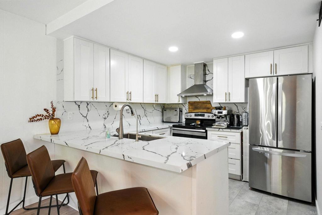 Updated Townhome Near Cowles Mountain | Oversized Bedrooms • 2 Parking Spots • VA Approved Welcome to 7812 Tommy Dr #19 – a beautifully updated 2-bedroom, 1.5-bath townhome located just steps from Cowles Mountain and Mission Trails in the heart of San Carlos. Inside, you’ll find a light-filled layout with modern finishes, central A/C, energy-efficient windows, and a private enclosed patio perfect for relaxing or entertaining. Both bedrooms are oversized, offering plenty of space for a home office, reading nook, or extra storage. The home also features full-size side-by-side laundry closet and two dedicated parking spots, with ample guest parking available on the street. Situated in a well-maintained, VA-approved and Fannie Mae-compliant community with amenities including a pool, spa, sport court, and clubhouse. Close to parks, top-rated schools, shopping, and dining — this is San Carlos living at its best.