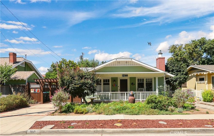 Charming 1921 Colonial Bungalow with Modern Comforts. This beautifully maintained single-story, 2-bedroom, 2-bath Craftsman-style home is the perfect blend of vintage character and thoughtful updates. Step inside to a light-filled Living Room with original hardwood floors, crown molding, and custom built-ins that add timeless appeal. The spacious Kitchen features stainless steel appliances, generous counter space, and plenty of room to inspire your inner chef. The Primary Bedroom is warm and inviting, with handsome hardwood floors, ample closet space, and French doors that open to a serene backyard retreat. The remodeled Primary Bath feels like your own personal spa, complete with a quartz vanity, custom walk-in shower, and built-in linen cabinet. A Second Bedroom offers abundant natural light, generous storage, and a ceiling fan for comfort. Additional highlights include attic storage with a pull-down ladder, a split HVAC system, and a tankless water heater for modern efficiency. Relax on the welcoming covered front porch, or entertain in the expansive backyard oasis featuring a tranquil koi pond, brick patio, and a designer privacy fence. The one-car garage offers a dedicated workspace, and the bonus studio is perfect for art, a home office, or a private retreat. Ideally located within walking distance to Peppertree Park and Old Town Tustin with its charming shops, restaurants, and historic buildings, this home is a true gem. Don’t miss the chance to fall in love with a property that blends classic charm with today’s comforts.