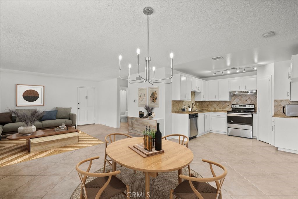 FHA APPROVED! Purchase this home with as little as 3.5% down! Incredible Value with Premium HOA Inclusions in the Heart of Tarzana! Welcome to 18555 Collins St #C30 - a beautifully updated 3-bedroom, 2-bathroom condo offering 1,178 sq ft of stylish living space, located in the highly desirable gated community of Collinwood Condominiums.
This home stands out not just for its design and layout, but also for its exceptional monthly HOA benefits. The HOA dues include high-speed internet, cable TV, water, hot water, earthquake insurance, trash service, and community security; services that, if paid separately, could significantly increase monthly expenses. It’s convenient, comfortable, and cost-efficient all in one. Inside, you'll find an open-concept floor plan filled with natural light and peaceful tree-top views. The updated kitchen boasts modern lighting, chic hardware, stainless steel appliances, and a brand-new dishwasher, flowing seamlessly into a spacious dining area perfect for both relaxed living and entertaining. The primary suite is tucked away in its own private wing with an en-suite bathroom for ultimate comfort. On the opposite side of the home, you'll find two additional bedrooms, offering privacy and separation—ideal for guests, children, roommates, or a dedicated home office. Community amenities include three sparkling pools, spas, courtyard gardens, a playground, a recreation room, and a half-court basketball area, all behind secure gated access. The unit also comes with two parking spaces with storage. Just minutes from Ventura Blvd, the 101 Freeway, shops, schools, and Tarzana’s vibrant dining scene—with easy access to Beverly Hills, The Westside, UCLA, and Downtown LA via the 101 and 405—this location balances tranquility and accessibility. Whether you're a first-time buyer, downsizer, or investor, this home offers one of the best values in Tarzana. Schedule your private showing today! * Some photos have been virtually staged.