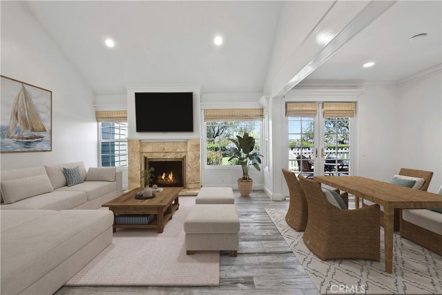 Located in one of the most premium locations on the Harbor View Knoll greenbelt, with wide open greenbelt and mountain views from every level.  This light and bright residence features 2 bedrooms/2.5 bathrooms with vaulted ceilings, durable wood flooring throughout the main floor living areas, and a cozy fireplace that adds warmth and charm.  The kitchen overlooks the beautiful greenbelt and mountain view, and includes recessed lighting, stainless steel appliances, creating an ideal space for cooking and entertaining.  All bedrooms are located upstairs, including a spacious primary retreat with a bay window view of the greenbelt and mountains, ample closet space, and its own en-suite bath. Enjoy both a private patio and an upper deck—perfect for soaking in the sun or relaxing outdoors. With no neighbors behind, you’ll appreciate the added sense of privacy. Additional highlights include a private elevator for convenience and increased accessibility, central A/C, an attached two-car garage, and access to fantastic community amenities such as a pool, spa, and tennis court.  Ideally situated to nearby Newport Hills Shopping Center & Bonita Canyon Sports Park.  Easy access to the 73 freeway and only minutes to Fashion Island, Corona Del Mar Village and beaches, the Bluffs Shopping Center, and Newport North Shopping Center!  Also located within the highly-rated Newport Mesa School District, and zoned for award winning Andersen Elementary School.  This is Newport Beach living at its finest!