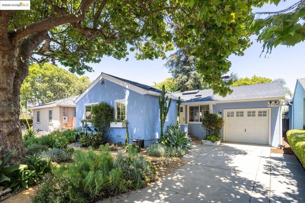 Open Houses July 12 & 13 12-3PM. Welcome Home to Your Dreamy California Cottage! Tucked into a sweet, tree-lined corner of Paseo del Campo, this beautifully updated single-level 3-bed, 2-bath home offers a perfect blend of warmth, comfort, and California charm. Step into the light-filled kitchen, complete with sleek stainless-steel appliances—including a dishwasher and five-burner gas stove. Gorgeous flooring runs throughout the home, leading you to a serene primary suite with a modern en-suite bath w/dual showerheads. Dimmable LED pocket lights, central air conditioning, and dual-paned windows ensure year-round comfort and efficiency. Curl up by the tile-framed, wood-burning fireplace on cooler evenings, or head outside to the expansive, sun-drenched deck—ideal for entertaining, hosting a bounce house party, or letting the pups run free. The lush backyard is bursting with mature landscaping, including a flourishing lemon tree, a majestic redwood, graceful palms, and vibrant succulents—your own private slice of the Golden State. Just minutes from BART (less than 2 miles), the Capitol Corridor (3 miles), and the San Mateo Bridge (under 5 miles), this home combines idyllic living with commuter convenience. California Village life at its finest.