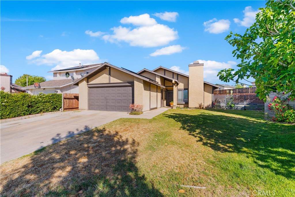 Welcome to this beautiful single-story home located in a quiet cul-de-sac. This well-maintained propery features 3 Bedrooms and 2 bathrooms, along with an attached 2-car garage. the spacious living room offers a comfortable layout perfect for family gatherings, complemented by a dedicated dining room. The master bedroom includes its own private bathroom and a generous closet. Each additional bedroom has its own closet and easy access to the second full bathroom. Enjoy the newer laminate flooring throughout the home, and stay comfortable year-round with Central air and heat, installed just about a year ago. Step outside to the inviting back patio- perfect for hosting unforgettable BBQs family and friends
