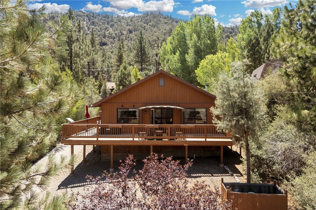 Wake up in the mountains, coffee in hand, and not a thing left to do but enjoy it—because 15400 Mil Potrero Hwy comes fully furnished and ready from day one.
Inside, the open single-level layout feels warm and welcoming, with sunlight spilling in from each window. The kitchen features brand-new stainless-steel appliances (including a gas stove), granite counters, and an oversized island that’s just as good for morning pancakes as it is for evening wine with friends.
You’ll stay comfortable in every season with central AC and heat, plus an electric fireplace for extra coziness in the colder months.
Step outside and the deck opens to sweeping mountain views—your front-row seat to every sunrise and sunset.
In the back, you’ll find an oversized one-car garage with room for a workshop, plus a huge under-house storage area for all your gear and seasonal extras.
Whether you’re looking for a weekend escape or a full-time mountain home, this one is turnkey in every sense—just bring your bags and settle in.
Ownership in Pine Mountain Club includes membership in the Property Owners Association, with dues of $165 per month. This provides access to a variety of amenities: an Olympic-style pool and spa, tennis and pickleball courts, a nine-hole scenic golf course, an equestrian center, and more. The community also offers essential year-round services like 24/7 patrol, trash and recycling pickup, road maintenance, and snow removal. For added peace of mind, Kern County Fire Station 58—equipped with paramedics and a helipad—is located right in the community to ensure fast emergency response when needed.