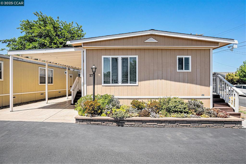Welcome to this beautiful home located in a friendly family mobile home park in Oakley. This 2/1 beauty features a spacious family room that can be converted into a 3rd bedroom, updated kitchen and bathroom, central AC and heater systems, all new windows and doors, new flooring, concrete work done in 2021, roof and awning done in 2022, diming recessed lights, gas stove, top of the line kitchen appliances, extra outdoor storage space for workshop and washer and dryer, Earthquake braced and much more! This home is conveniently located close to schools, shopping, restaurants, parks and public transportation. Must see to appreciate! Fireplaces: NO