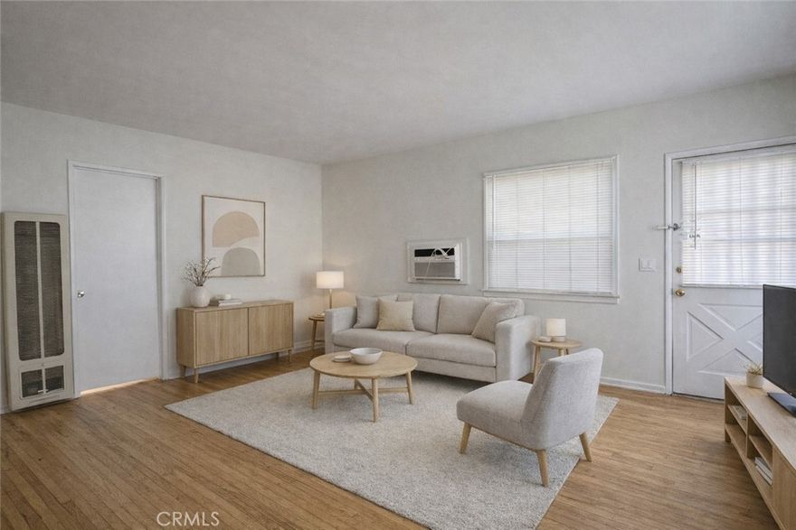 Charming 2-bedroom, 1-bath apartment pairs vintage details with modern comfort and includes a private 1-car detached garage. Step inside to beautiful original hardwood floors and a spacious living area that feels warm and welcoming. Recent improvements include a new split-system A/C + heating unit, fresh interior paint, and new double-pane windows throughout for added comfort and energy efficiency. The home features a cozy galley-style kitchen with a stove included, plus a dedicated dining area, perfect for everyday meals or hosting a friend for dinner. Shared laundry is available in the building. Utilities: Water is included. Tenant pays gas and electricity. If you’re looking for a classic apartment with thoughtful upgrades and the bonus of a garage, this one checks all the boxes.