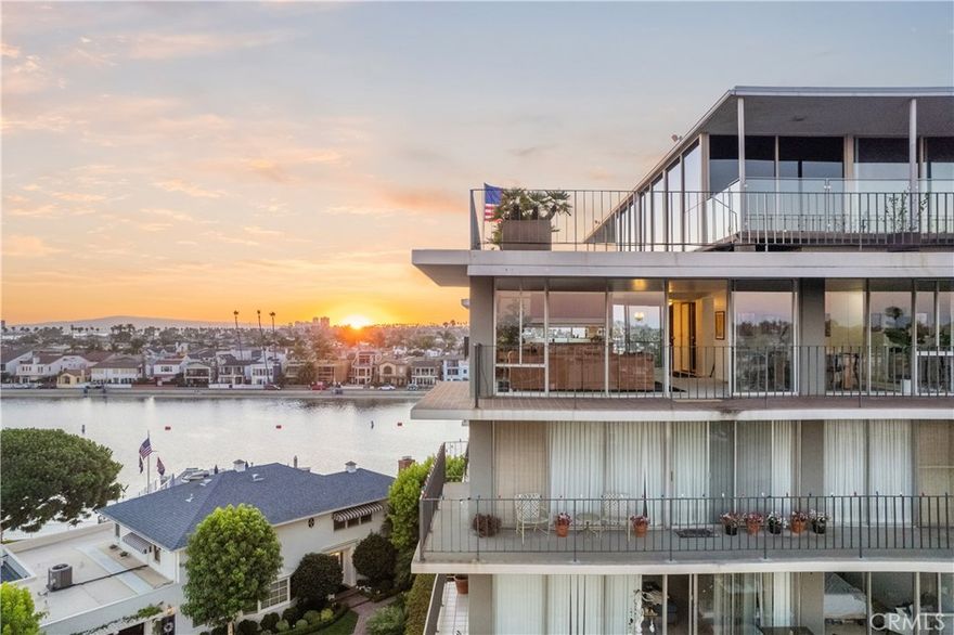 Welcome to 5400 The Toledo, designed by renowned architect Hugh Gibbs and home to one of the rarest and most incredible oceanfront condos you may ever see on Naples Islands. Unit 601/603 is not only expansive by way of sheer square footage, but also boasts one of the most spectacular panoramic views all of the Long Beach coast has to offer. Pulling into one of this condo's two side by side gated parking spaces, you may notice the building's consideration and care which carries from the secured parking garage, into the 24 hour secured lobby, continuing all the way from the elevator to the front door of unit 601 at the end of the hall. Walking inside, you'll more than likely feel a blast of cool ocean air before you notice the reflection in the hall closet of what's to come. Although the kitchen is to your right and a hallway to your left, it's hard not to observe what's directly in front of you. Walking into the living room adjoined by a formal dining area, you're greeted with floor to ceiling 180 degree views from Catalina to the Mountains. When you finally gather yourself and comprehend the impressiveness of what you're seeing, you can head into the galley kitchen accompanied by a bar top with potential for hosting and serving alike. Wrapping back around, you'll find yourself looking down a hall which leads you past 3 guest bedrooms and 3 guest bathrooms, bookmarked with one of the largest and most expensive condominium en-suites in 90803. Aside from the perks of over 2200 square feet, extra storage, guest bedrooms and additional parking, having two units turned into one also offers the perks of a walk-in primary closet with its own laundry hook ups, space for an additional refrigerator with water line, and bedside views from the coast of Long Beach all the way to Laguna. Finding a rarity like this would be a once in a lifetime find in itself, but adding the 30 foot dock into the equation is where things get just that much more special. Whether you plan to walk to the restaurants, award winning schools, or take the boat out for a cruise, coming back home everyday to arguably the best view in town could be just that easy.