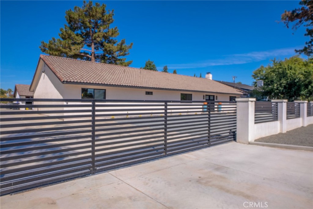 Fully Renovated Modern Retreat with Pool & 3-Car Garage on ½ Acre.
Discover this stunningly remodeled 3 bedroom, 2 bathroom home, perfectly blending modern luxury with effortless California living. Set on a spacious half acre lot, this property offers a rare combination of style, comfort, and function complete with a 3 car detached garage and a sparkling private pool. Inside, every detail has been thoughtfully reimagined. Enjoy luxury waterproof vinyl plank flooring, brand-new high-efficiency windows, and fresh drywall, paint, and finishes throughout. The open-concept chef’s kitchen shines with GE Café appliances including a convection oven, refrigerator, and dishwasher paired with sleek quartz countertops, new cabinetry, and a timeless glass subway tile backsplash. Retreat to two spa inspired bathrooms featuring frameless subway tiled showers, quartz counters, and 7 foot soaking tubs, creating the perfect blend of function and relaxation. Additional upgrades include all new attic insulation, recessed lighting, and designer fixtures, ensuring both style and efficiency. Step outside to your private oasis. The freshly poured concrete patio and upgraded landscaping surround a glistening pool, framed by a low maintenance yard with turf, gravel, DG, and a drought tolerant cactus garden, no grass, no heavy upkeep. A brand-new six camera security system adds peace of mind. Tons of parking for toys and RVs on this half acre lot. Whether entertaining friends or enjoying quiet evenings at home, this property offers it all modern design, smart efficiency, and resort style outdoor living.