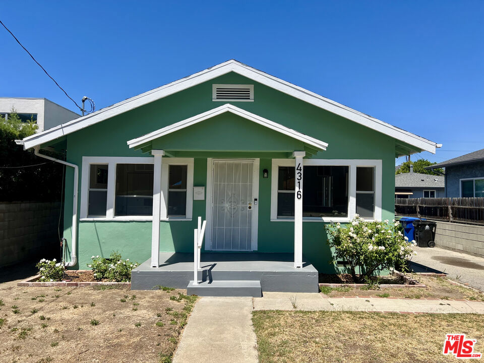 Charming 3-bedroom, two-bath home with a detached two-car garage in Atwater Village. This home is located on a low-traffic street in this sought-after neighborhood. Freshly painted inside and out, it features a new central HVAC and an efficient layout. The main entrance leads to a generous open floor plan, offering creative options for dining and living areas that are flooded with light and feature beautiful wood floors. There are two bedrooms located at the front of the house, along with a remodeled front bathroom. The third bedroom is located at the back of the house and features an en-suite bathroom. The refreshed kitchen features new hardware, lighting, a stove, and a hood. A laundry room with a washer and dryer is located off the kitchen, leading to the large backyard, which features a concrete patio with a pergola. There is another garden area behind the two-car garage with a large fruit tree. The front and back yards are completely fenced in, and the property features a long driveway with ample room for parking three cars. The house features updated copper plumbing, an electrical panel, and newer gutters. A prime location is quickly accessible to Los Feliz Silver Lake and the neighboring NELA neighborhoods.