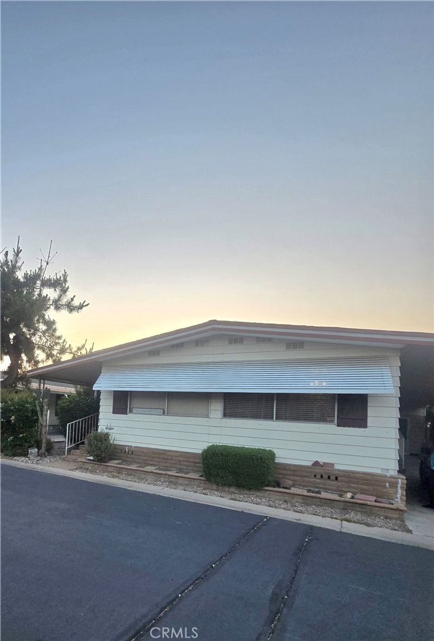Discover your future home in the serene Lark Park Soboba Springs, a welcoming 55-plus community. This expansive mobile home offers 1,536 square feet of comfortable living space, thoughtfully designed to meet your needs. Key Features: The home boasts two large bedrooms and two bathrooms, providing ample space for relaxation and privacy. Living Areas: Enjoy a variety of living spaces, including a cozy living room, dining room, and family room, perfect for entertaining guests or spending a quiet evening at home. Enclosed Patio: Step into your enclosed patio, an ideal spot for enjoying morning coffee or peaceful afternoons in a private setting. Storage Solutions: extra storage space both inside and outside, you'll have plenty of room to organize your belongings. Convenience: The home includes its own laundry room, adding to the convenience and ease of living. Visitor Parking: Visitor parking is conveniently located right across the street, making it easy for friends and family to visit. This mobile home in Lark Park Soboba Springs combines comfort, convenience, and community living. Embrace the tranquility and amenities of this wonderful mobile home park!