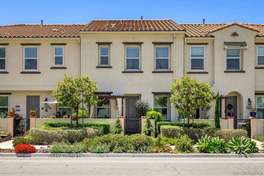 Welcome to Mission Lane, one of Oceanside's newest and most highly desired communities! This beautiful 2-story townhome was just built in 2019, and still holding a structural warranty. The private porch at the entrance provides the perfect spot to start your day with a cup of coffee. Inside, soaring ceilings and an open-concept layout feel both spacious and inviting. The upstairs features a versatile loft area, perfect for a home office or play space, while generous walk-in closets provide plenty of storage. This community is a true standout, offering resort-style amenities that are perfect for families and pet owners alike. Imagine your weekends spent at the spectacular pool and spa, grilling at the BBQ area, or enjoying the large park and other entertaining spaces. With low HOA fees and no Mello Roos, you get to enjoy all of these perks without the extra cost. Location is everything, and this home delivers. You'll have easy access to the highway, making your commute a breeze, and you're just minutes from everything Oceanside has to offer. This neighborhood is also just a stone's throw from the future Wave Park, ensuring this area is full of growth and opportunity. Don't miss your chance to live in a community that perfectly blends modern living with an active, coastal lifestyle!