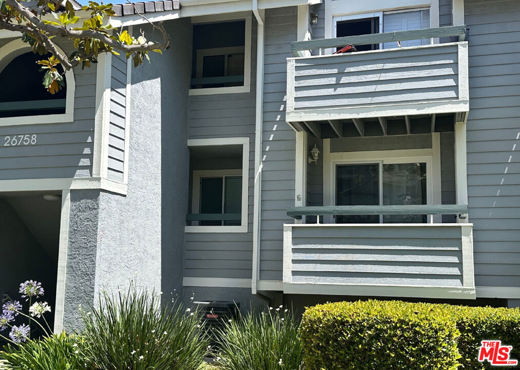 Welcome to this beautifully updated and completely move-in ready lower-level condo, designed for comfort, style, and convenience. Step into a bright and inviting living room filled with natural light, featuring wood laminate flooring, fresh paint, and a cozy fireplaceperfect for relaxing evenings. A sliding glass door opens to your own private balcony, ideal for outdoor dining or peaceful mornings with coffee.The modern kitchen is equipped with upgraded countertops, sleek stainless steel appliances, and durable flooring. A charming bay window brings extra light into the adjacent dining area, creating a warm and welcoming atmosphere.This home offers two generously sized bedrooms, each with ceiling fans for comfort. The spacious primary bedroom includes an en-suite bathroom with a walk-in shower, upgraded vanity, and a stylish modern countertop. The second bathroom is equally updated, offering a shower/tub combo and elegant vanity.A unique spiral staircase leads to an enclosed loftperfect for a home office, guest space, or additional living areafeaturing high ceilings and its own ceiling fan.Additional highlights include an in-unit stacked washer and dryer, and a two-car tandem garage. The community offers fantastic amenities such as a sparkling pool, relaxing spa, tennis courts, and tranquil sitting areas.Located just minutes from freeways, schools, beautiful parks, shopping, and dining this condo offers the perfect blend of lifestyle and location.