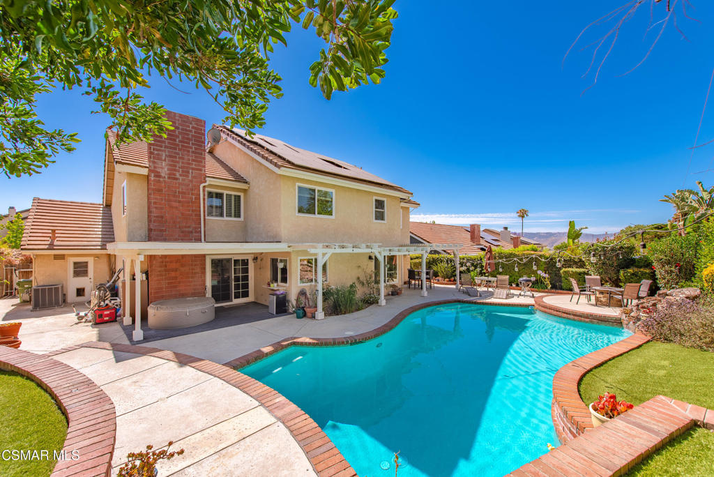 Luxury Living with a Private Pool Retreat in beautiful Simi Valley!Welcome to your dream home in one of Simi Valley's most desirable neighborhoods! Tucked away on a peaceful cul-de-sac, this move-in ready 4-bedroom, 3-bath beauty blends style, function, and comfort in perfect harmony.Step inside to soaring ceilings, elegant crown moulding, and an open-concept layout filled with natural light. The remodeled chef's kitchen features sleek granite countertops, a designer backsplash, stainless steel Samsung appliances, walk-in pantry, and a convenient breakfast bar and dining nook--ideal for entertaining or casual meals.The spacious primary suite is your personal sanctuary, with vaulted ceilings, a cozy fireplace, custom shutters, and a spa-inspired en suite bath boasting dual granite vanities, a soaking tub, separate shower, slate tile flooring, and a large walk-in closet.Outside, your private backyard oasis awaits--featuring a sparkling pool with waterfall, separate above-ground spa, cozy firepit, and two covered patios perfect for relaxing or hosting guests.Additional highlights include:3-car garage with sleek liquid granite flooring, OWNED SOLAR, NEST smart system & RING security, Dual-pane windows & doors, tankless water heater, central HVAC, Recessed lighting, plantation shutters, ceiling fans, and wet bar, two large USABLE attic spaces for extra storage, fresh exterior with new stone siding and stucco.This home truly has it all--style, upgrades, energy efficiency, and space to unwind. Homes like this rarely come up. Don't miss your chance to own a slice of paradise -schedule your tour today!