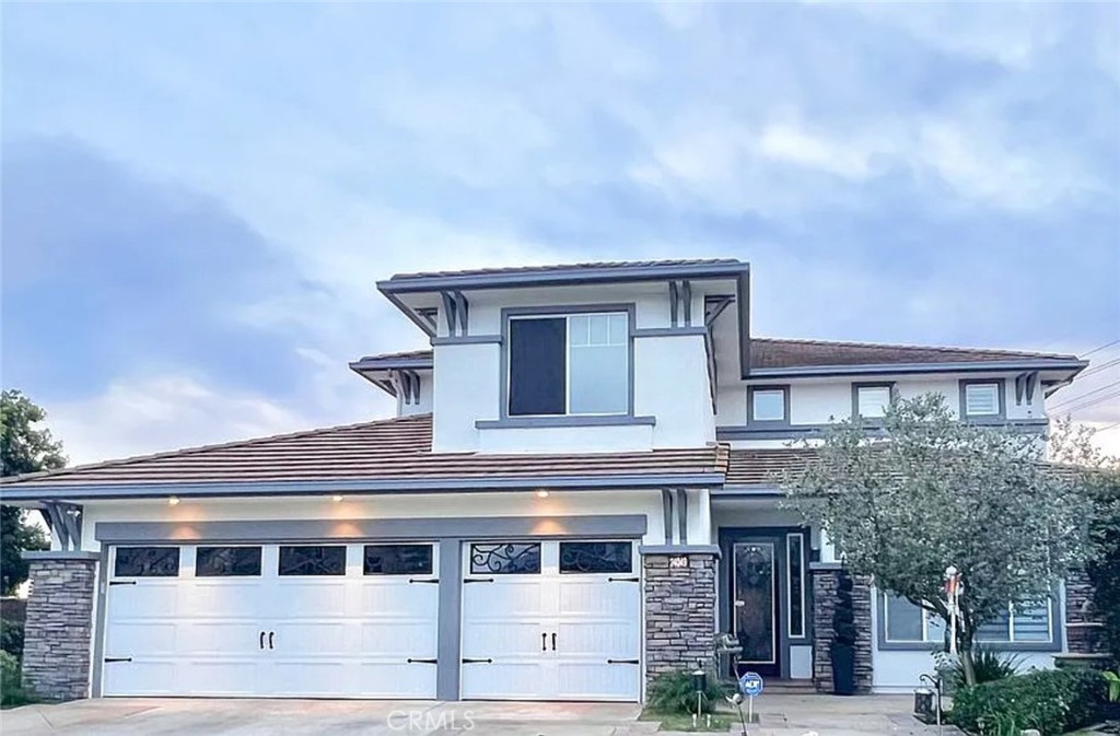 Exquisite Cul-de-Sac Home with Panoramic Views. Situated on a premium, elevated lot, this recently re-piped 5-bedroom, 4.5-bath residence offers breathtaking city light and hillside views. Enhanced with a fully paid-off solar energy system and a whole-house water filtration system, it combines elegance with modern efficiency. Step inside to warm hardwood floors, formal living and dining rooms, and a chef’s kitchen featuring a center island, white cabinetry, stone finishes, Viking 6-burner range, dual ovens, microwave, walk-in pantry, and serene garden views. The family room boasts a stacked-stone fireplace, custom built-ins, and stunning views of the backyard oasis. The main level includes a guest suite with en-suite bath and a dedicated office with in-wall, high-quality cabinetry—ideal for work-from-home or easily convertible into a sixth bedroom. Upstairs, the luxurious primary suite offers a private balcony, dual walk-in closets, granite-topped vanities, a soaking tub, stone flooring, and a separate walk-in shower. Additional bedrooms include a Jack-and-Jill with individual vanities and a private en-suite suite. The entertainer’s backyard features a new pool and spa with Baja step, iPad-controlled heating, lighting, and waterfall, plus a built-in BBQ, fire feature, and an enchanting English garden with ambient lighting. Located in a desirable community with private lake access, minutes from premier shopping and dining. Additional interior photos coming soon.