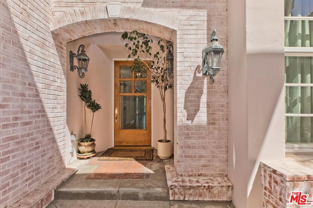 Photo of 12683 Promontory Road, Los Angeles, CA 90049 (MLS # 25579475)