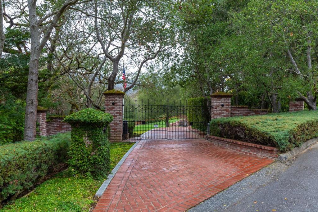 PRICE IMPROVEMENT!! Reduced by $1,000,000 & Ready for your Clients! Remarkable in so many ways, this extraordinary Hidden Valley property on 3+ acres is extensively remodeled, structurally retrofitted, and expanded over the years. Every inch is beautifully appointed with sophisticated designer elegance. Main residence has a spacious office and 4 bedrooms, including a main-level primary suite with 2 couture closet rooms and sumptuous marble bath. Large detached building with executive office and overhead studio guest house, each with bath and kitchenette. Spacious terrace, pool, and vast stretches of lawn intertwined with walking paths encircling the entire property. Also suitable for up to 6 horses. This magical Woodside area is just minutes to 280, Sand Hill Road, Stanford University, and excellent Portola Valley schools. Luxurious livability, acreage, privacy, and every amenity needed for today. Property is NOT on Leased Land.