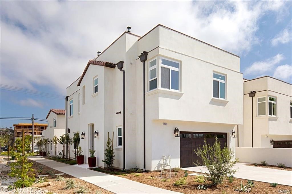 WALK TO EVERYTHING and enjoy OCEAN VIEWS in this GORGEOUS newer construction DANA POINT luxury home with ROOFTOP DECK! Your new home is just steps away from a scenic lookout point over Dana Point Harbor, and walking distance to restaurants and shopping
in the iconic Lantern District in downtown Dana Point. This wonderful home features an open floor plan with beautiful fixtures and finishes. Enjoy an ocean view from your new primary suite as well as a walk-in closet, dual sinks, a large soaking tub and walk-in shower. The two secondary bedrooms upstairs also have ensuite baths and there is a bonus room on that same level. The kitchen boasts sleek European-style cabinets, a huge center island with built-in gas cooktop, and stainless steel appliances, and opens to a living and dining area. The high ceilings add to the openness and the light and airy feeling. The living room even features a gas fireplace for those warm and cozy nights. Your outdoor living areas continue the luxury feeling with a built-in barbecue and fire pit in your backyard, enclosed by evergreen trees for added privacy. The large rooftop deck showcases spectacular ocean and city lights views. You will also enjoy your own 2 car garage with 2 car driveway and individual laundry room with washer and dryer included in the lease. Dana Point Harbor and the local recreation opportunities are fantastic with water sports, boating, paddle-boarding, surfing, hiking, golfing, and more! Hurry before the special gem is gone!
